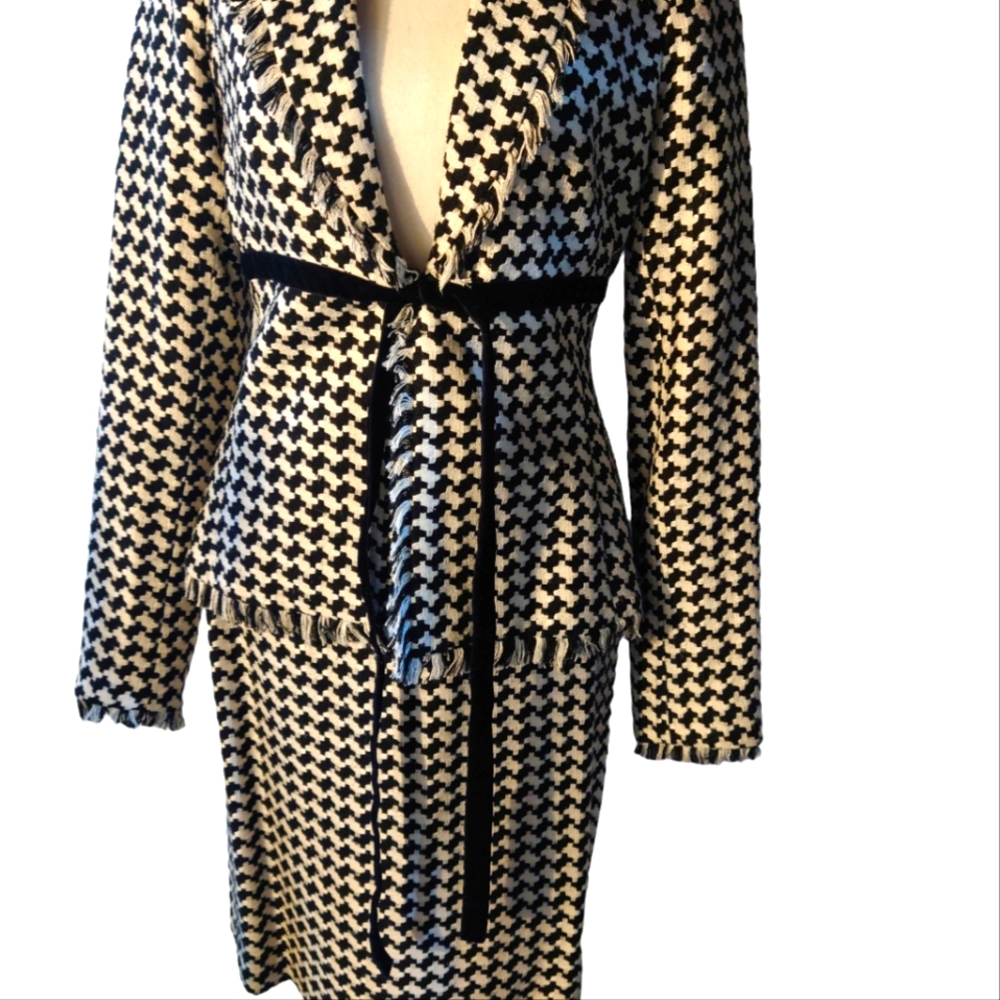 Black and white two-piece tweed blazer and skirt with fringe. Size 6